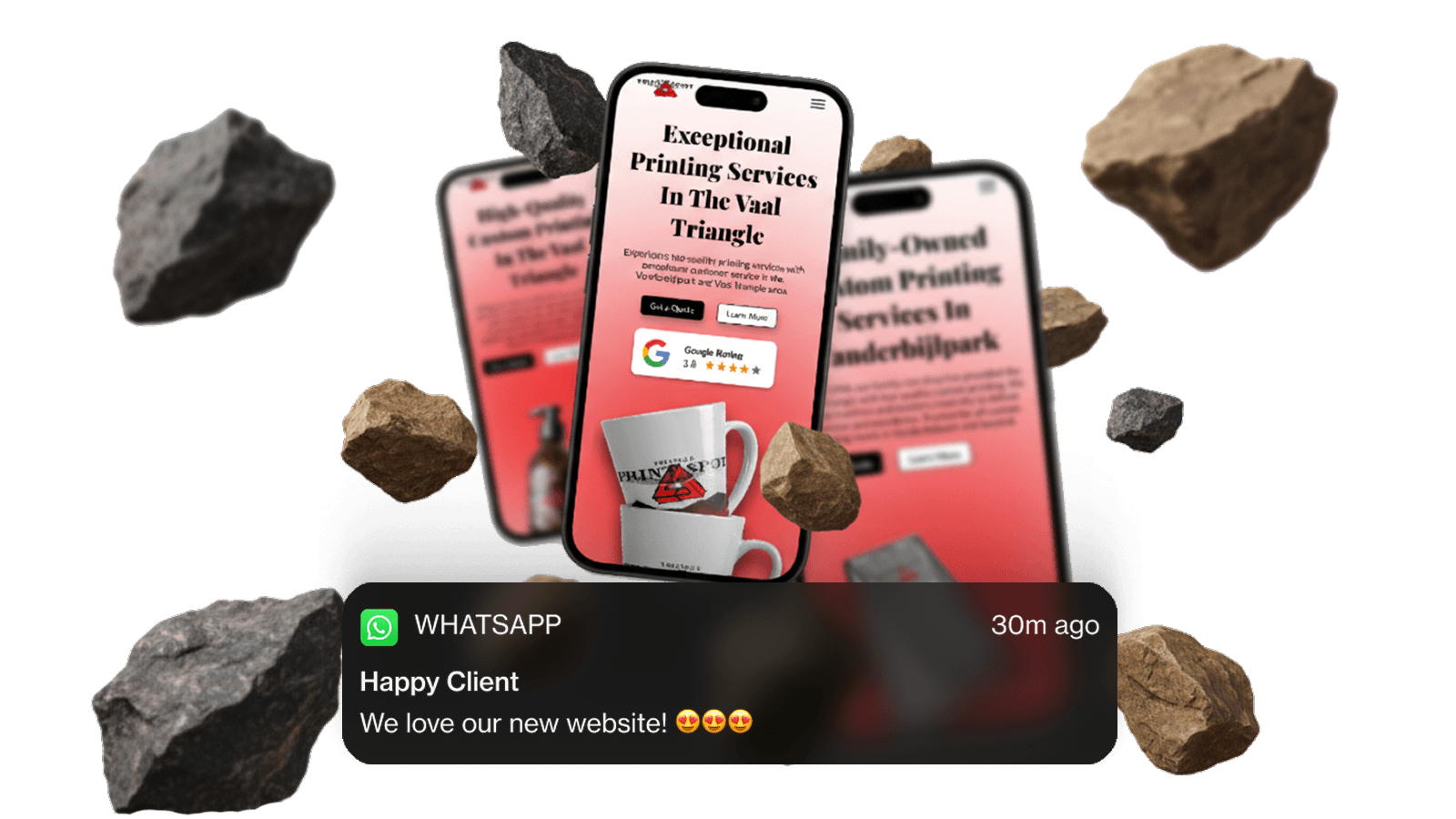 Three smartphone screens display a printing services website with red tones. Floating rocks surround the phones. Below, a WhatsApp message reads, "We love our new website!" with heart-eyes emojis, expressing excitement and satisfaction.